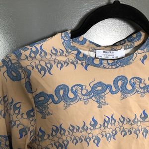 NWT Super cool thong body suit.  flame and dragon design